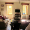 Great Room at la Baume des Pelerins looking towards Living area and out to the village houses on Grande Rue