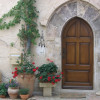 Welcome to Maison des Pelerins - the Front door shown here is in the style of the Gothic arch, which distingusihes it from most of the arches in Sablet which are Roman style arches 