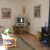 Entering the Living Room at Maison des Pelerins - a wood stove can be seen to the right of the picture