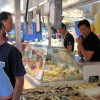 Cheese vendors display a myriad of varieties at the markets of Provence