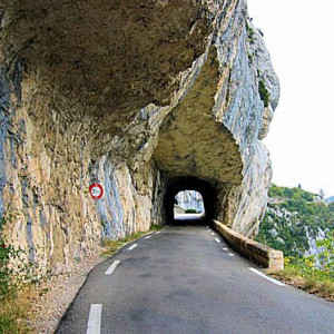 Roadway tunnels through the rock canyon above the Gorges de la Nesque