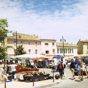 Isle sur la Sorgue's Sunday Market on the banks of the Sorgue River