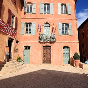 Village houses of all sizes display the colors of Roussillon