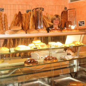  Boulangerie Festival owner - Madame Moulin - always cheerful - the store is well stocked with great bread and pastires