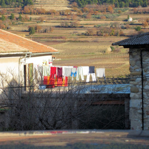  Colorful washing hanging out to dry in the garden of a village house