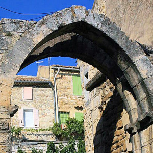 Provence - Visan - buildings seen through a gothic arch -  image source - JM Rosier