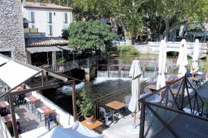 Riverside seating at Restaurants in the village
