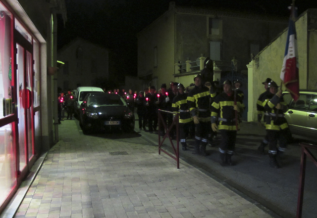 Christmas in Provence - St Barbe's Feast, Sablet - The procession comes through Le Petit Portail towards the village square